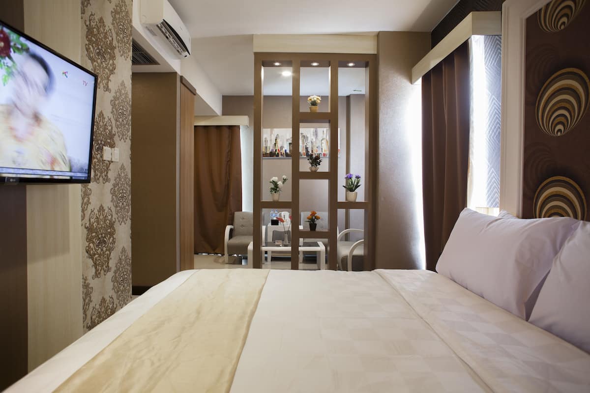 Suite | 1 dormitorio, escritorio, wifi gratis y ropa de cama
