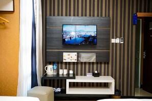 Habitación Deluxe con 2 camas individuales | Escritorio, wifi gratis y ropa de cama 