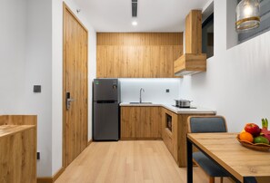 Habitació doble superior | Zona de menjador de l'habitació