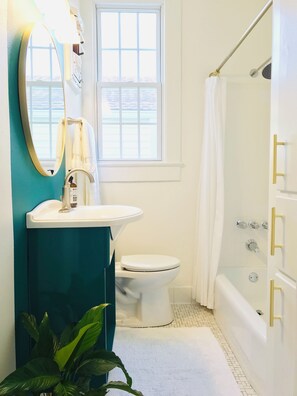 Hair dryer, towels, soap, shampoo