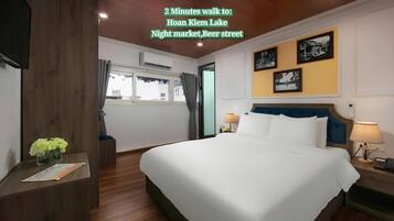 Quarto luxo, 1 cama Queen, vista para a cidade | Frigobar, cofres nos quartos, escrivaninha