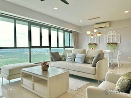 Family Apartment, 4 Bedrooms, Bathtub | Living area | 42-inch Smart TV with cable channels, Netflix, streaming services