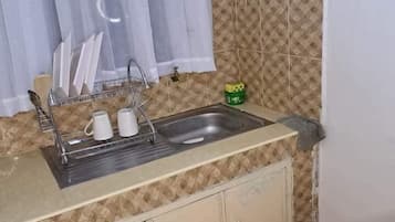 Fridge, microwave, cookware/dishes/utensils