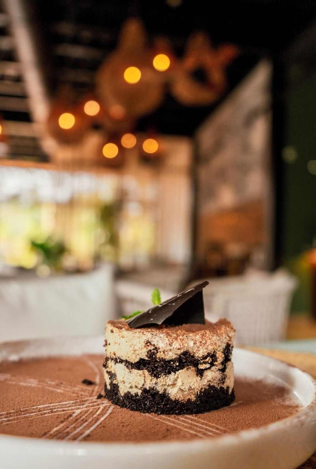 A dessert on a plate with a blurred background.