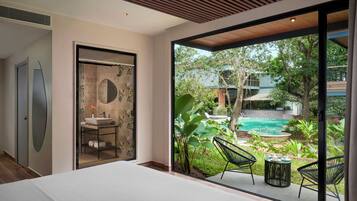 Deluxe Room, 1 King Bed, Pool View, Ground Floor | 1 bedroom, premium bedding, down duvets, free minibar