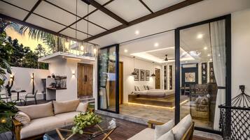 Deluxe Villa, 1 King Bed, Bathtub, Garden View | Living area | 32-inch Smart TV with digital channels