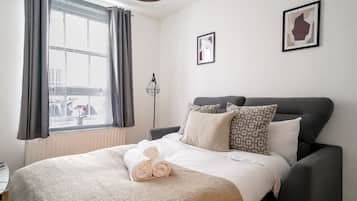 Apartamento urbano | Área de estar | Smart TV 40 polegadas com canais via satélite