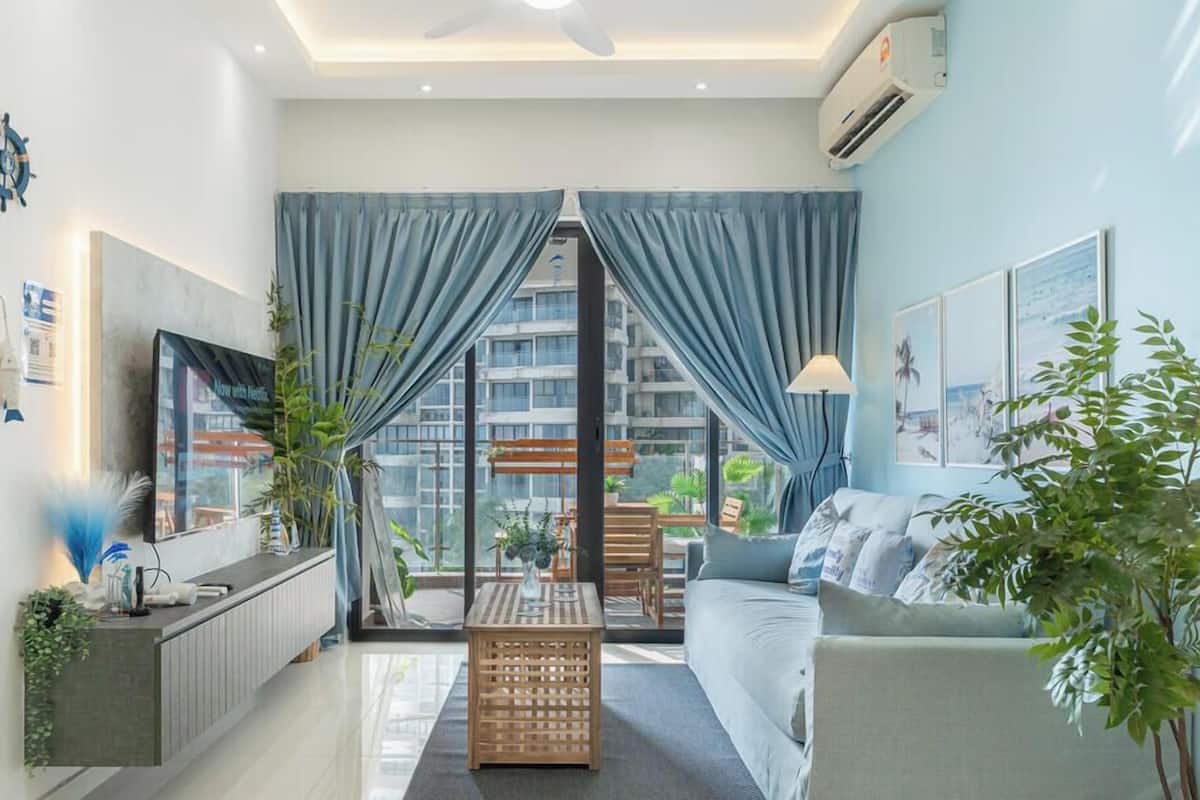 Deluxe Apartment, 2 Bedrooms, Sea View | Living area | 55-inch Smart TV with cable channels, Netflix, streaming services