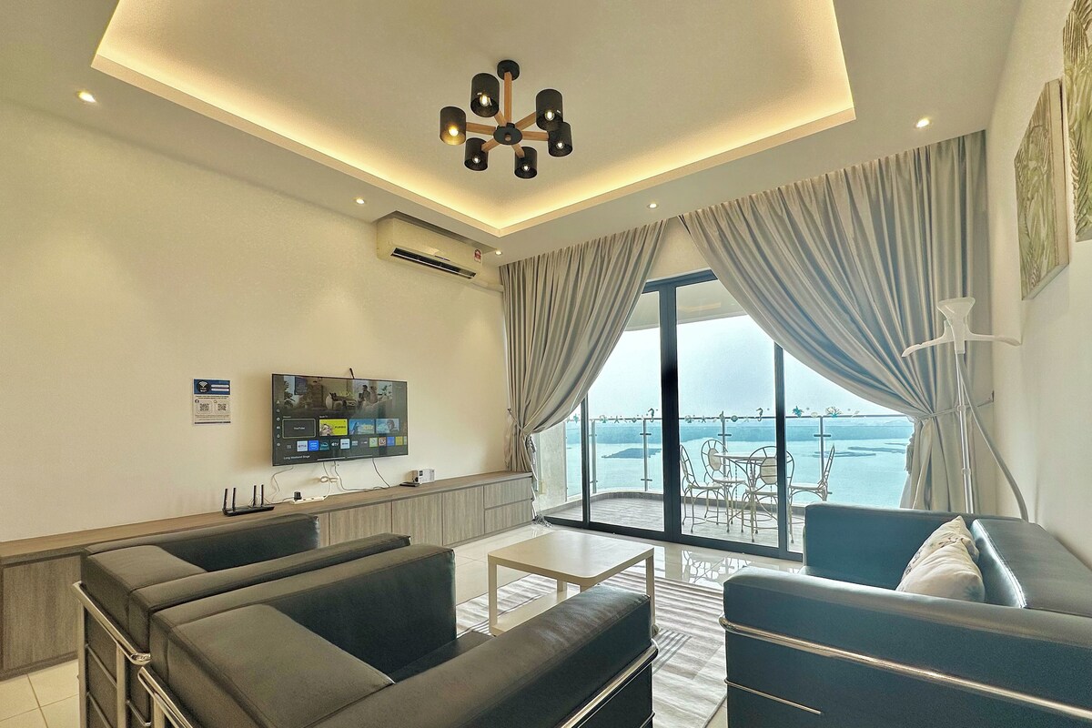 Deluxe Apartment, 3 Bedrooms, Sea View | Living area | 55-inch Smart TV with cable channels, Netflix, streaming services
