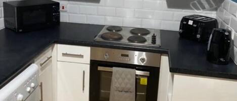 Apartment | Private kitchen | Fridge, microwave, oven, stovetop