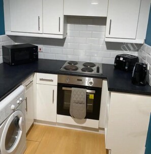Apartment | Private kitchen | Fridge, microwave, oven, stovetop