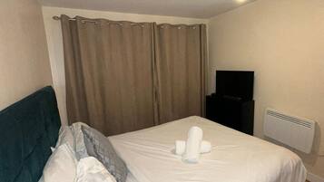 Apartment, 1 King Bed | 1 bedroom, iron/ironing board, free WiFi, bed sheets