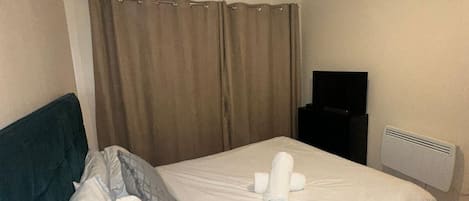 Apartment, 1 King Bed | 1 bedroom, iron/ironing board, free WiFi, bed sheets