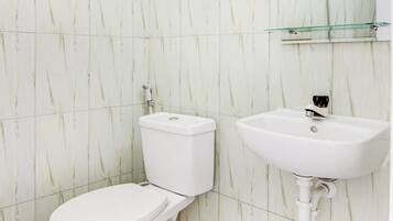 Shower, towels, toilet paper
