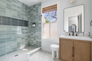 Shower, hair dryer, towels, shampoo