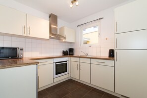 Geladeira, fogão, cooktop, lava-louças