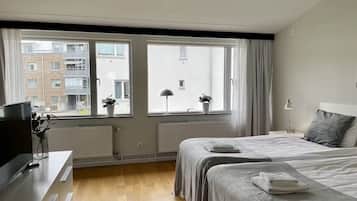 Apartment, 1 Bedroom | 1 bedroom, desk, blackout curtains, iron/ironing board