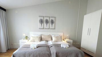 Apartment, 1 Bedroom | 1 bedroom, desk, blackout drapes, iron/ironing board