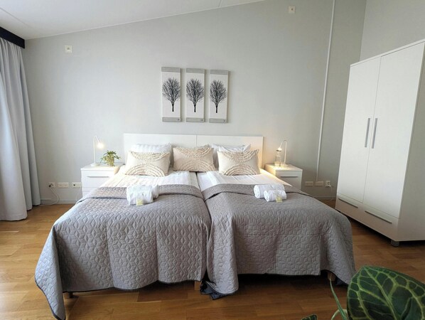 Apartment, 1 Bedroom | 1 bedroom, desk, blackout drapes, iron/ironing board