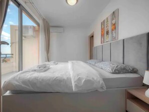 Apartamento família | 2 quartos, Wi-Fi de cortesia, roupa de cama