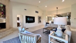 TV, fireplace, table football - The Suite Spot | Contemporary Comfort, Lap Pool & 3 Ensuite Bedrooms โ a Greenday property! (Rancho Mirage)