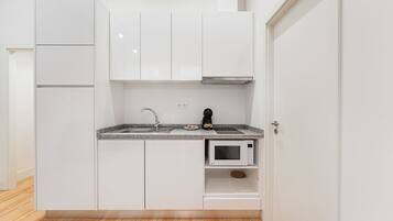 Fridge, microwave, coffee/tea maker, toaster