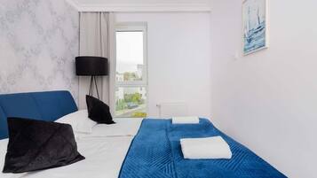 2 chambres, fer et planche à repasser, Wi-Fi, draps fournis