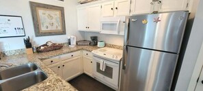 Condo, 2 Bedrooms | Private kitchen | Fridge, oven, coffee/tea maker, toaster