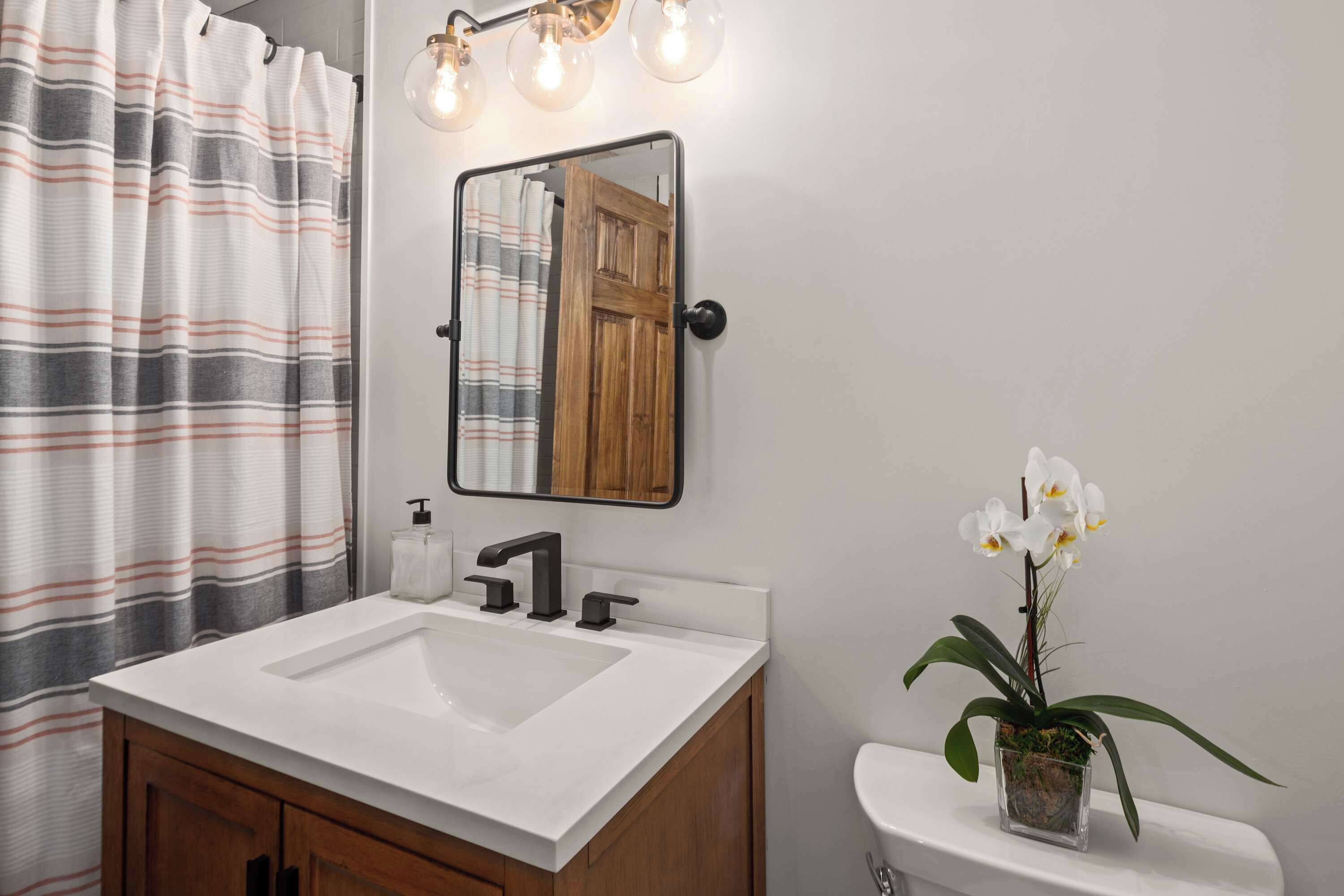 Shower, hair dryer, towels, shampoo