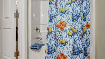 Hair dryer, towels, soap, shampoo