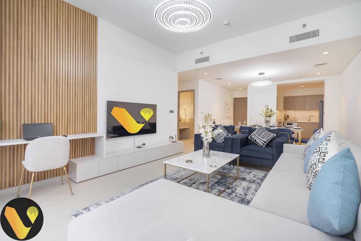 Elite Apartment | Living area | 65-inch Smart TV with satellite channels
