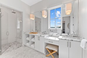 Shower, hair dryer, towels