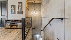 A staircase with a metal railing leading to a lower level. - Dandy’s Ranch.
Dream Mountain Home! (Morrison)