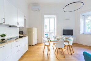 City Apartment | Private kitchen | Full-size fridge, microwave, stovetop, espresso maker - Piazza Amedeo Flat by Wonderful Italy (Naples)