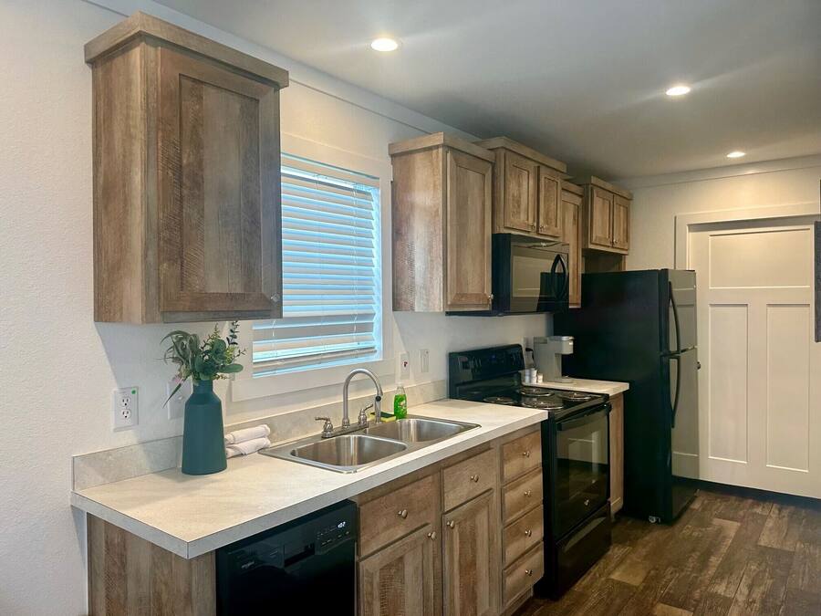 Cottage, 1 chambre | Cuisine privée | Grand réfrigérateur, micro-ondes, four, plaque de cuisson