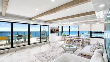 Luxury Oceanfront Condo 2BR 2.5BA with 700Sqft Terrace, Sauna, Resort Amenities & Pools 1501 | Living area | 45-inch flat-screen TV with cable channels