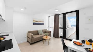Appartement Économique | Coin séjour | Télévision à écran plat