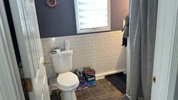 Shower, towels, soap, toilet paper