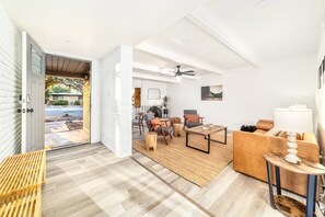 Smart TV, fireplace, table football, books