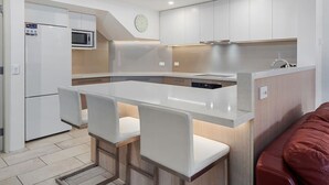 Coffee/tea maker, fridge, microwave, oven