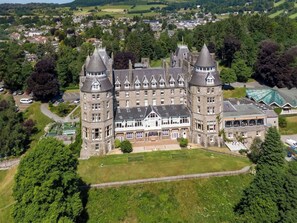 A large, historic castle with multiple towers and a central courtyard. - Family Lodge No. 3 - UK45692 (Pitlochry)