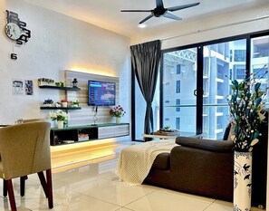 Classic Apartment, 1 Bedroom, Balcony, Pool View | Living area | 48-inch Smart TV with cable channels, video-game console, Netflix - Atlantis Residence 2 (Malacca City)