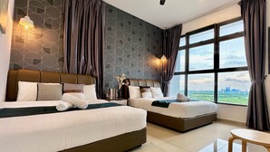 A hotel room with two beds, a view of the city, and a large window. - Atlantis Residence 2 (Malacca City)