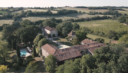 Idyllic French château surrounded by rolling hills- Chateau de Lassalle