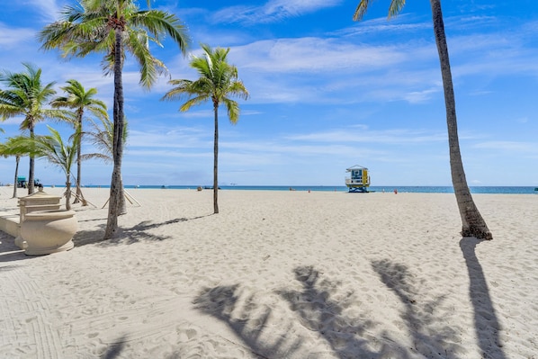 On the beach, sun loungers, beach towels
