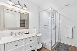 Shower, hair dryer, towels, soap