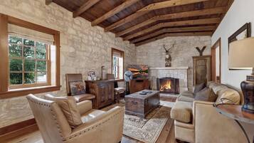 House, Multiple Beds, Patio (3503 RM 2721- Main) | Living area | Fireplace