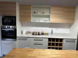 Enjoy cooking in this well-organized kitchen with appliances and ample counter space.