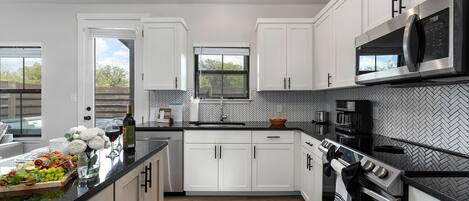 Condo, Multiple Beds, Hot Tub, Pool View | Private kitchen | Fridge, microwave, oven, stovetop