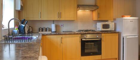 Astianpesukone, syöttötuoli